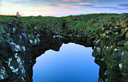 Suavidade - Foto com um temporizador. Seu arco natural que pode ser facilmente atravessado, mas com cuidado, pois tem somente 2m de largura.